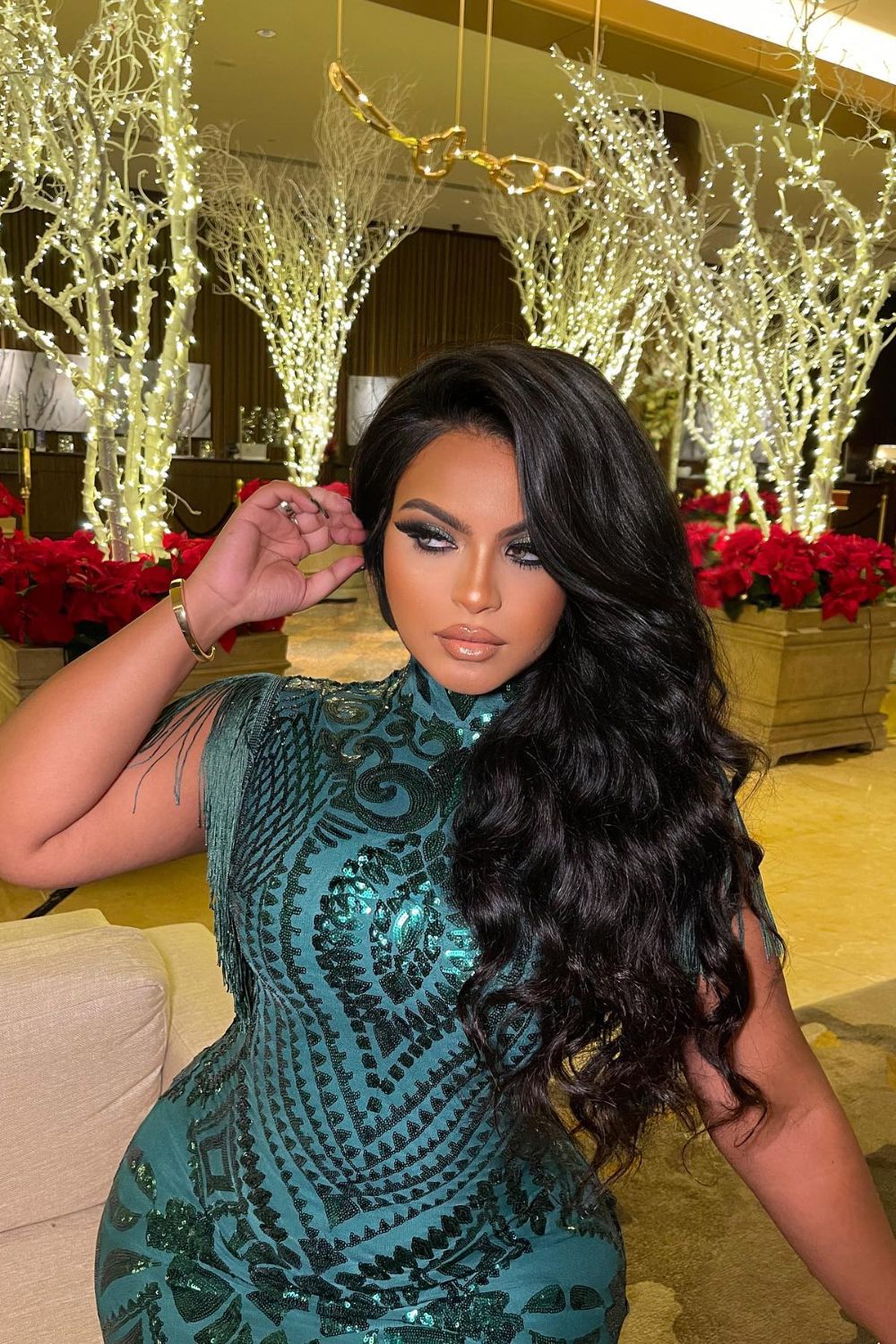 kylie emerald green dress Kylie Jenner and Stormi in emerald mother-daughter outfits at Kardashian Christmas party