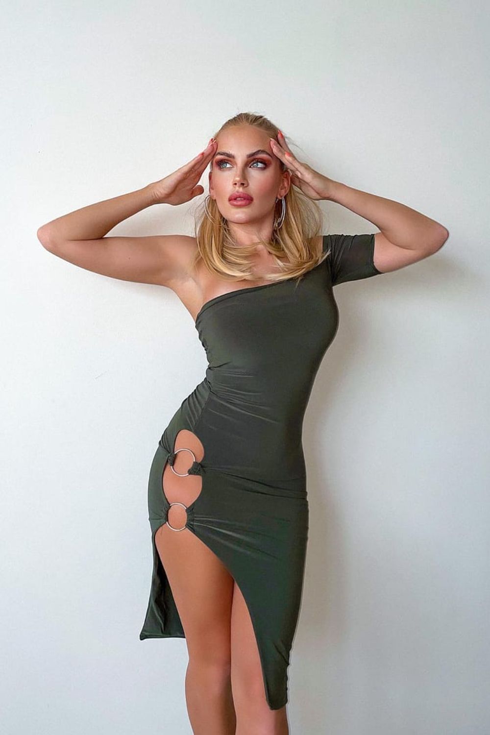 Green skin tight online dress